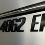 Black Boat Registration Numbers emblem