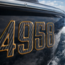 Custom Domed Carbon Fiber Boat Registration Numbers – Premium 3D Raised Decals with Bronze Trim