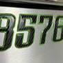 Boat Registration Stickers - Domed Carbon Fiber Numbers with Green Trim Custom