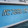 boat-registration-numbers-installed-on-hull