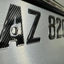 Carbon Fiber with Chrome Trim – Domed Boat Registration Numbers Custom