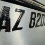 Carbon Fiber with Chrome Trim – Domed Boat Registration Numbers Custom