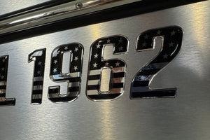 black and chrome boat lettering