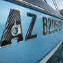 Carbon Fiber with Chrome Trim – Domed Boat Registration Numbers